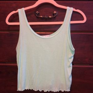 Ruffled hem (at bottom) Tank